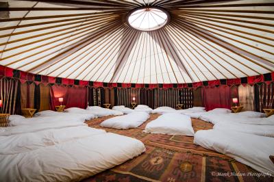 28ft yurt with 18 single floor mattresses